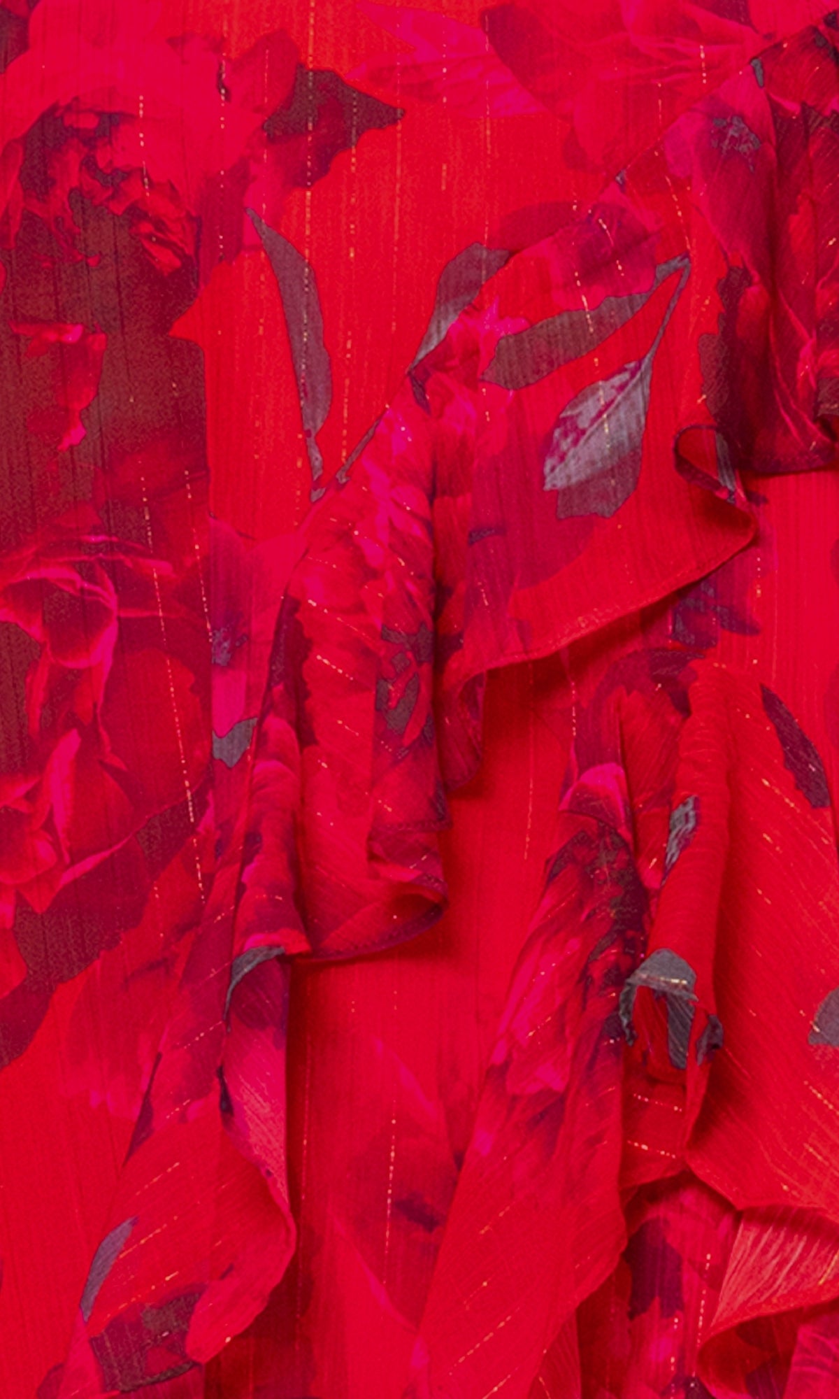 Close-up of the Betsy & Adam A27036 Long Red Floral Formal Dress featuring intricate floral prints, subtle metallic threads, and elegant ruffle detailsโideal as an evening gown.